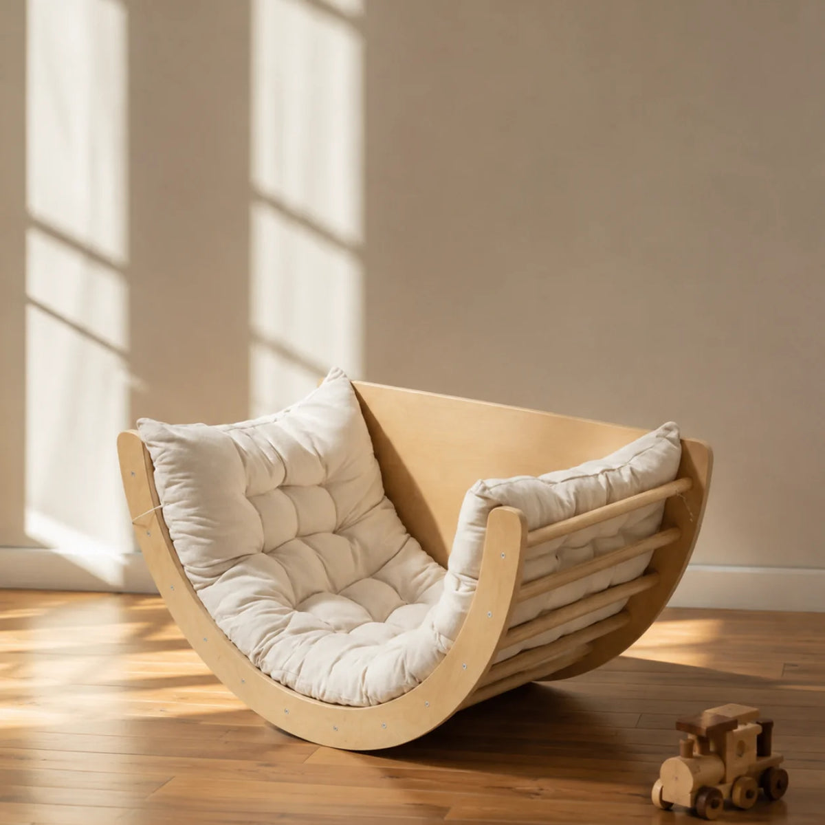 A beautifully designed curved lounge chair created to bring comfort, movement, and warmth into your child’s space. 