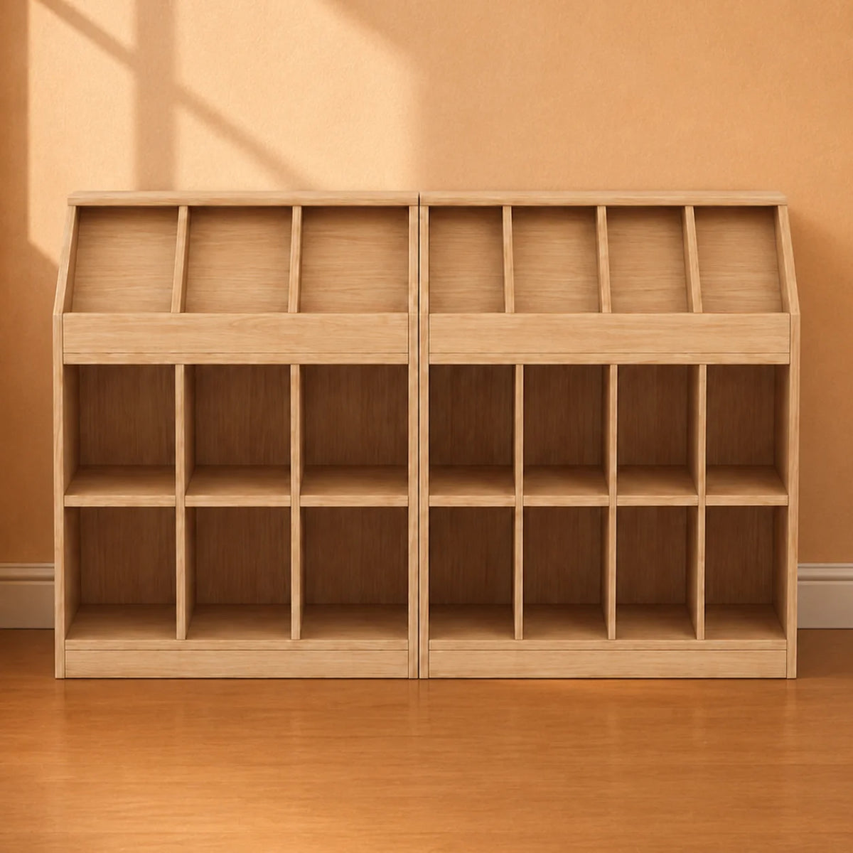 A light natural wood two-compartment shelving unit with multiple cubby compartments, set against a warm beige wall and wooden floor.