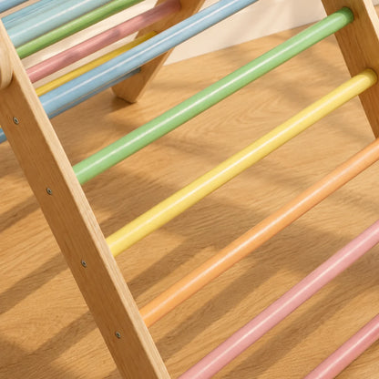 Close-up of a wooden climbing frame with pastel-colored horizontal bars in green, yellow, peach, pink, blue, and light green on a light wood floor.
